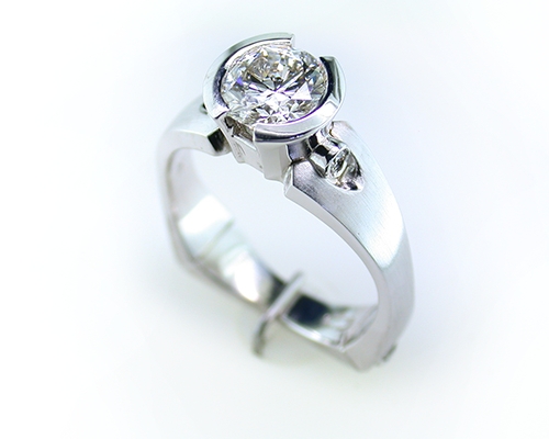 Once the wax is approved it is cast in your desired metal. We work in all gold alloys, silver and platinum. In fact, we are the only jeweler in Omaha that casts platinum in house. After the casting is complete our skilled craftsman sets the stones and finishes your piece.